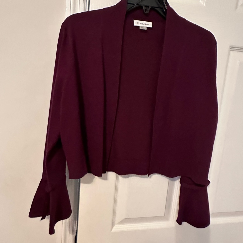 Calvin klein open front cardigan , bell sleeves decorative metal.